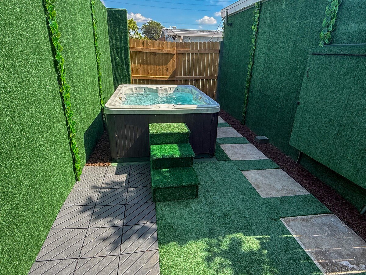 Hot tub in a private turf-lined courtyard