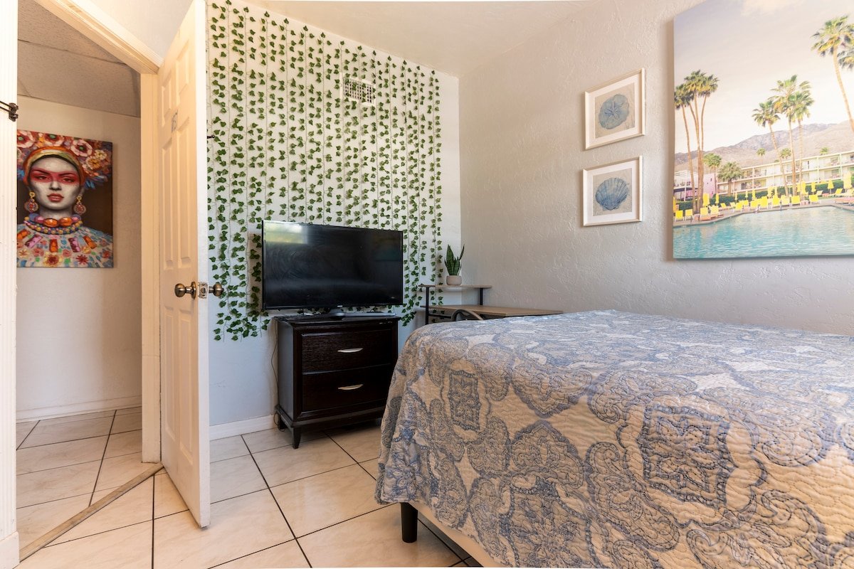 Room West with TV on dresser and bed